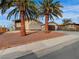 Charming single-story home featuring desert landscaping, a two-car garage, and gated courtyard at 6870 Laronda Ln, Las Vegas, NV 89156