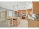 Beautiful eat-in kitchen with an island and stainless steel appliances that provides both style and functionality at 6870 Laronda Ln, Las Vegas, NV 89156