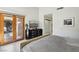 Spacious bedroom features backyard access, neutral colors, and great natural light at 7315 Mission Hills Dr, Las Vegas, NV 89113