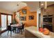 Charming dining area with modern chandelier, space for four, and sunny window at 7315 Mission Hills Dr, Las Vegas, NV 89113