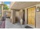 Covered front porch with decorative elements, offering a warm welcome to the home at 7315 Mission Hills Dr, Las Vegas, NV 89113