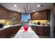 Updated kitchen featuring stainless steel appliances, modern cabinetry, and a stylish backsplash at 7315 Mission Hills Dr, Las Vegas, NV 89113