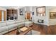 Inviting living room boasts hardwood floors, stylish decor, and an open concept design at 7315 Mission Hills Dr, Las Vegas, NV 89113