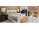 Comfortable bedroom with ample natural light and a neutral color palette at 7315 Mission Hills Dr, Las Vegas, NV 89113