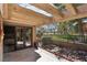 Relaxing outdoor patio featuring a covered pergola with views of the landscaped yard at 7315 Mission Hills Dr, Las Vegas, NV 89113