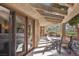 Charming covered patio with outdoor seating, perfect for relaxation and entertaining at 7315 Mission Hills Dr, Las Vegas, NV 89113
