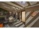 Outdoor patio area with pergola, seating, and decorative sun design at 7315 Mission Hills Dr, Las Vegas, NV 89113
