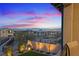 A view from the balcony shows the neighborhood's city lights and a manicured side yard at 754 Spirit Lake St, Las Vegas, NV 89138