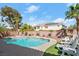 Backyard with a pool, spa, and lounge chairs, perfect for outdoor relaxation at 7682 Calm Passage Ct, Las Vegas, NV 89139