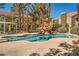 Enjoy the beautiful community pool and landscaping, perfect for relaxation and recreation at 7950 W Flamingo Rd # 1081, Las Vegas, NV 89147