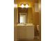 Bathroom featuring a white vanity with cabinet, sink, faucet, and a toilet at 8003 Retriever Ave, Las Vegas, NV 89147