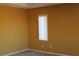 Cozy bedroom with carpet flooring, natural light, and neutral walls at 8003 Retriever Ave, Las Vegas, NV 89147