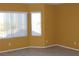 Comfortable bedroom with neutral carpet, natural light and window coverings at 8003 Retriever Ave, Las Vegas, NV 89147