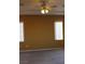 Bedroom featuring plush carpeting, ceiling fan, and two bright, window-lined walls at 8003 Retriever Ave, Las Vegas, NV 89147