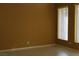 Bedroom featuring carpet, two windows with blinds, and a ceiling fan at 8003 Retriever Ave, Las Vegas, NV 89147