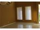 Open dining area featuring tile flooring, natural light and neutral paint at 8003 Retriever Ave, Las Vegas, NV 89147