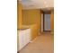 Upstairs hallway features carpet flooring, white cabinets, and neutral paint at 8003 Retriever Ave, Las Vegas, NV 89147