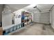 Spacious garage with ample storage, shelving, and an open layout at 8440 Wandering Sun Ave, Las Vegas, NV 89129