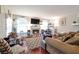 Cozy living room featuring a fireplace and hardwood floors at 8440 Wandering Sun Ave, Las Vegas, NV 89129