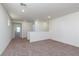 Second-floor bonus room with carpet, white walls, and a window at 9099 Nostrand Ave, Las Vegas, NV 89148