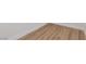 Close up on wood-look flooring with white trim at 9099 Nostrand Ave, Las Vegas, NV 89148
