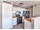 Bright kitchen featuring appliances, white cabinets, and light wood countertops at 1381 E University Ave # 204, Las Vegas, NV 89119