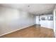 Spacious living room with hardwood floors throughout and neutral paint at 1381 E University Ave # 204, Las Vegas, NV 89119