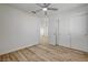 Bright bedroom with a closet and wood-look flooring, creating a comfortable and inviting space at 2573 Rafferty Creek Ln, Las Vegas, NV 89156