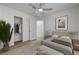 Neutral bedroom with closet and ceiling fan at 2573 Rafferty Creek Ln, Las Vegas, NV 89156