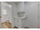 Laundry room with cabinets and a white countertop at 2573 Rafferty Creek Ln, Las Vegas, NV 89156