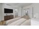 Comfortable main bedroom with ensuite bathroom and walk-in closet at 2573 Rafferty Creek Ln, Las Vegas, NV 89156