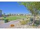 Well-manicured community park area with walking path and lush green space at 2713 Royal Tourist Rd, North Las Vegas, NV 89086