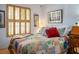 Cozy bedroom with shuttered windows at 283 New River Cir, Henderson, NV 89052