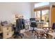 Bright home office with desks, chairs, and organized storage, perfect for working from home at 283 New River Cir, Henderson, NV 89052