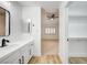 Bright bathroom featuring a white vanity with black hardware and modern fixtures at 2851 S Valley View Blvd # 1079, Las Vegas, NV 89102