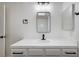 Bathroom featuring a white vanity, black fixtures, and great lighting at 2851 S Valley View Blvd # 1079, Las Vegas, NV 89102