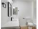 Stylish bathroom featuring a white vanity, black accents, and updated fixtures at 2851 S Valley View Blvd # 1079, Las Vegas, NV 89102