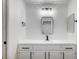 Clean bathroom with bright vanity, framed mirror, modern lighting fixture, and towel-hanging hardware at 2851 S Valley View Blvd # 1079, Las Vegas, NV 89102