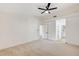 Expansive bedroom with carpet, ceiling fan, and multiple doorways and neutral wall colors at 2851 S Valley View Blvd # 1079, Las Vegas, NV 89102