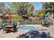 Community hot tub and seating area surrounded by mature trees and lush landscaping at 2851 S Valley View Blvd # 1079, Las Vegas, NV 89102