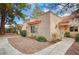 View of charming condo featuring desert landscaping, stucco exterior and tiled roofing at 2851 S Valley View Blvd # 1079, Las Vegas, NV 89102