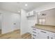 Bright eat-in kitchen features granite counters, white cabinetry and stainless-steel pulls at 2851 S Valley View Blvd # 1079, Las Vegas, NV 89102
