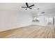 Open-concept living space featuring modern flooring, ceiling fan, contemporary lighting, and neutral decor at 2851 S Valley View Blvd # 1079, Las Vegas, NV 89102