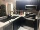Modern kitchen features stainless steel appliances, sleek countertops, and ample cabinet space at 2970 Juniper Hills Blvd # 102, Las Vegas, NV 89142
