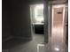 Bedroom with an adjacent bathroom featuring sleek vanity and stylish black and white tile at 2970 Juniper Hills Blvd # 102, Las Vegas, NV 89142