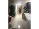 Bright hallway showcasing white marble floors and a seamless transition between rooms at 2970 Juniper Hills Blvd # 102, Las Vegas, NV 89142