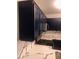Updated kitchen featuring navy cabinets and white marble countertops at 2970 Juniper Hills Blvd # 102, Las Vegas, NV 89142