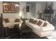 Inviting living room with comfortable seating, stylish decor, and ample natural light at 2970 Juniper Hills Blvd # 102, Las Vegas, NV 89142