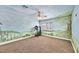 Unique room featuring custom mural, plush carpet, ceiling fan, and bright lighting at 3367 Trickling Stream Cir, Las Vegas, NV 89117