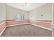 Bedroom featuring plush carpet, a ceiling fan, and bright natural light at 3367 Trickling Stream Cir, Las Vegas, NV 89117